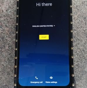 A Motorola G Play phone with case